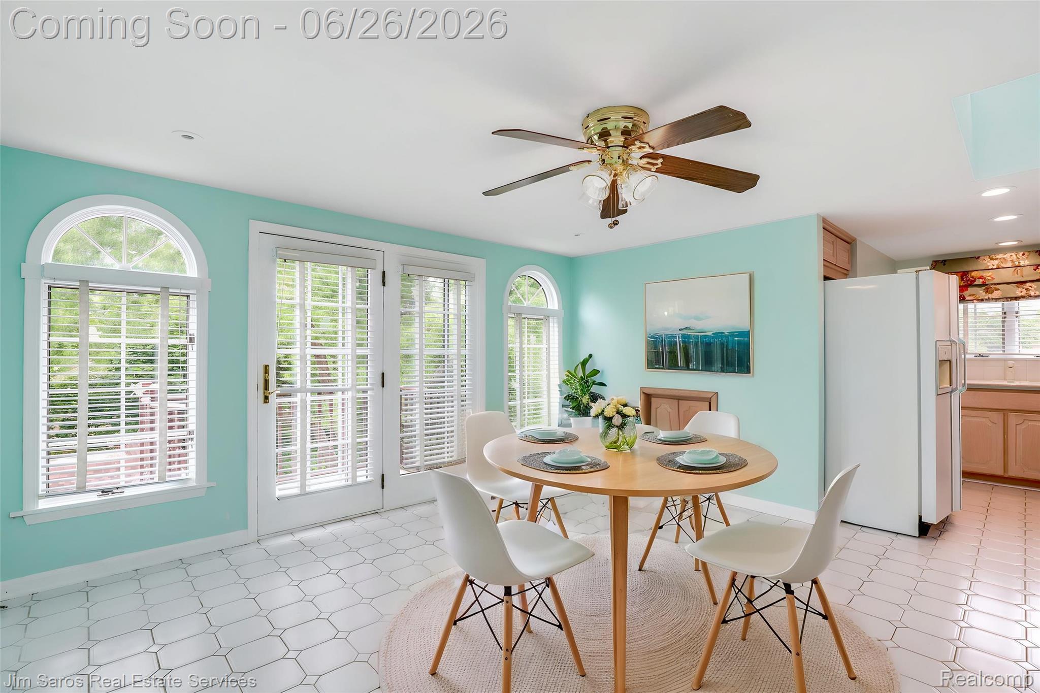 764 Harcourt Road Grosse Pointe, MI 48230 - Photo 29 of 42 Dining area featuring multiple arched windows and glass panel doors