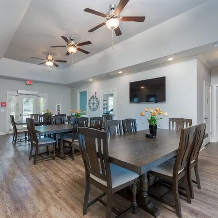 a view of a dining room with furniture