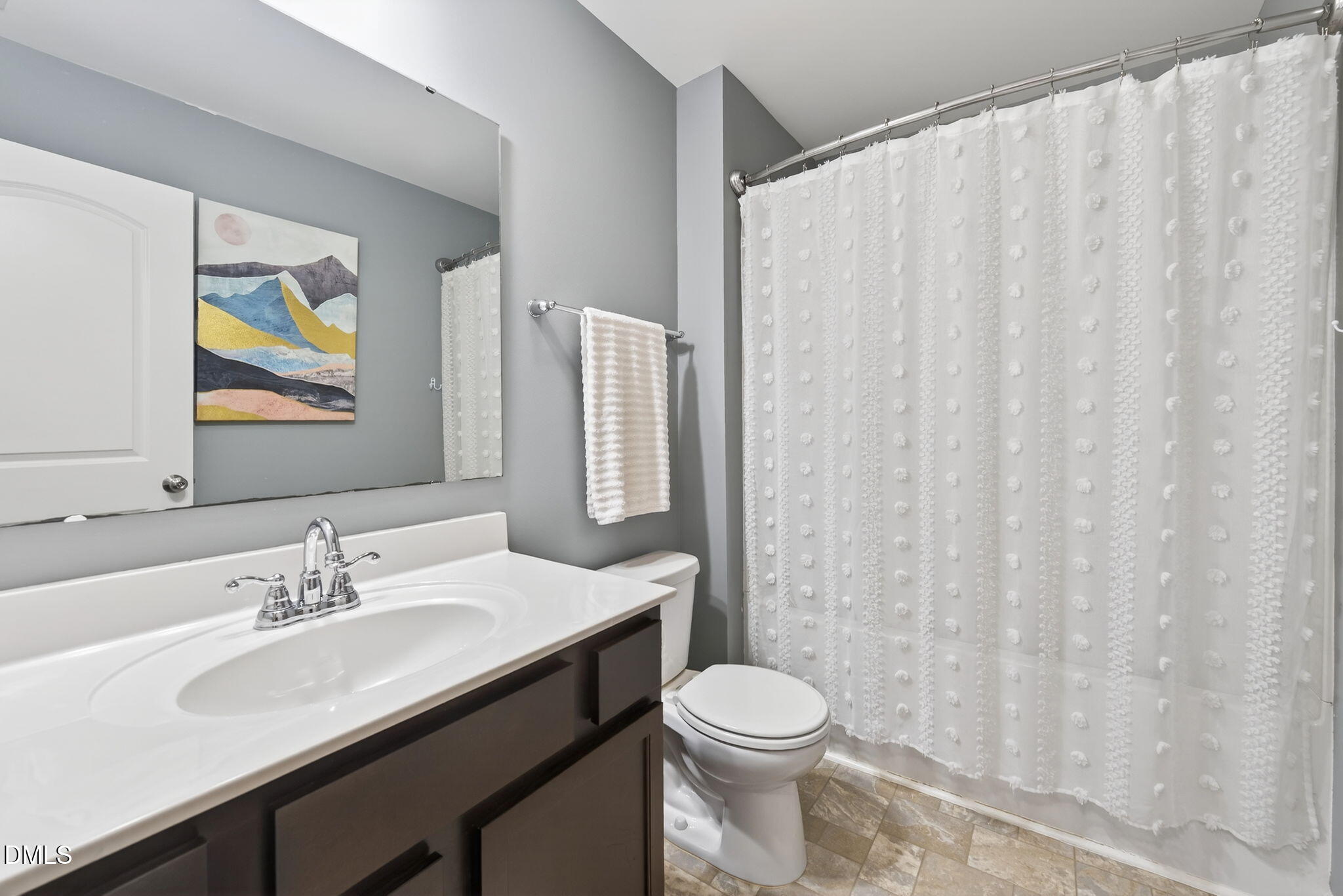 509 Houndstooth Lane Wendell, NC 27591 - Photo 25 of 33 a bathroom with a granite countertop sink and a mirror