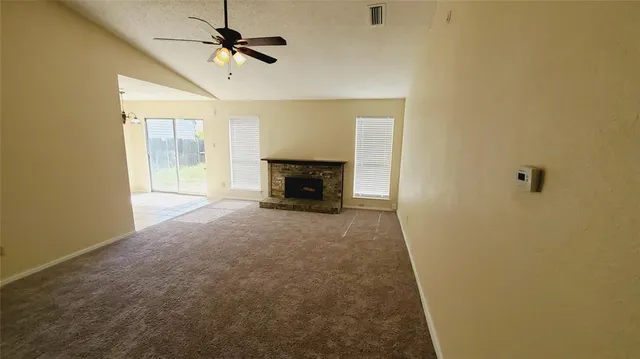 a view of a livingroom with a fireplace