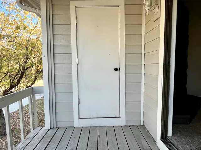a view of a yard from a balcony