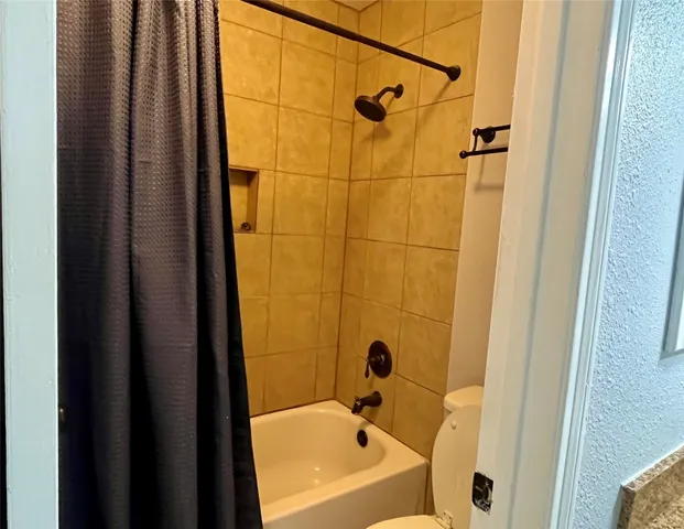 a bathroom with a bathtub