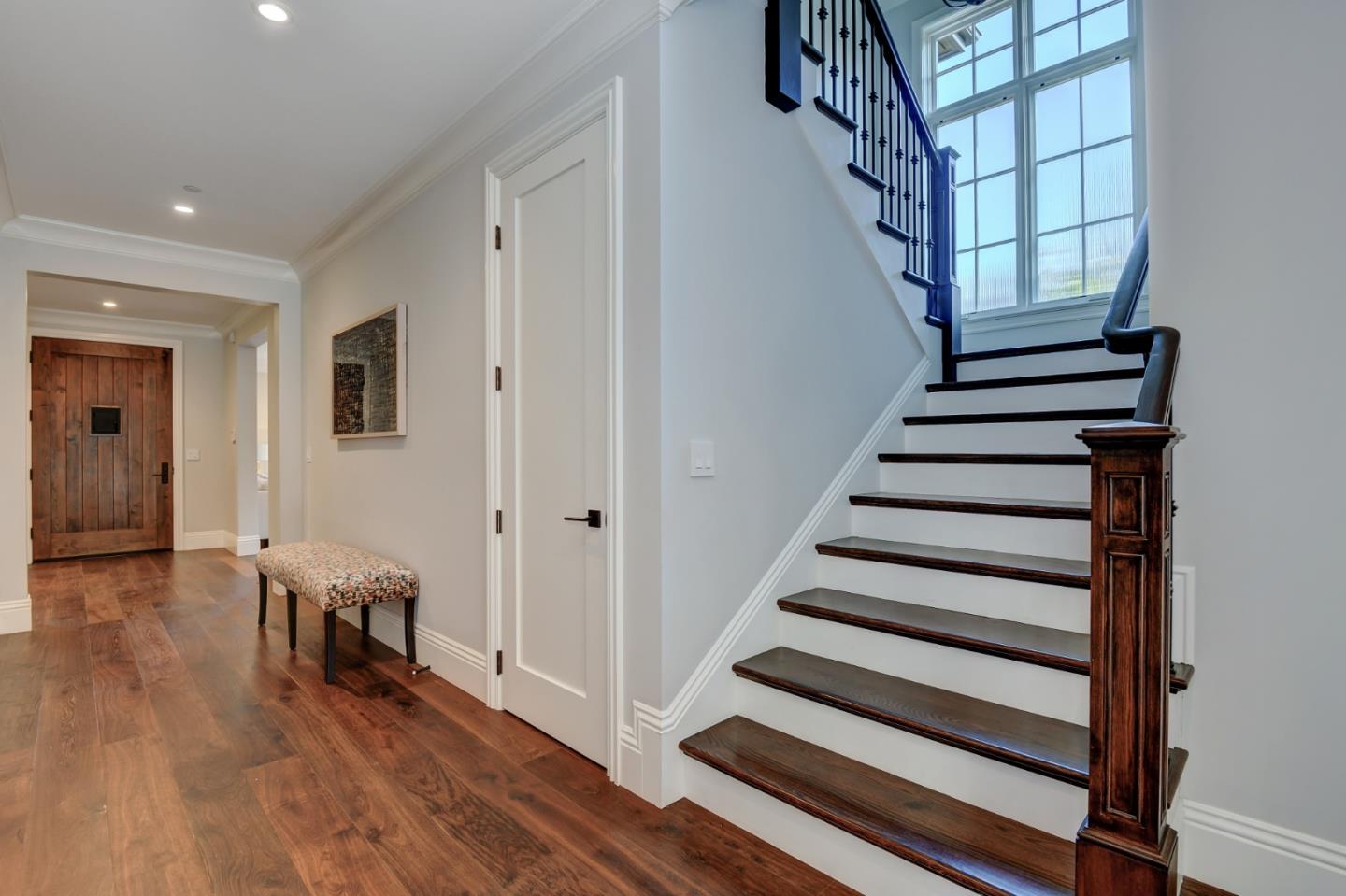 1025 Cabrillo Avenue Burlingame, CA 94010 - Photo 11 of 39 a view of entryway with wooden floor and stairs