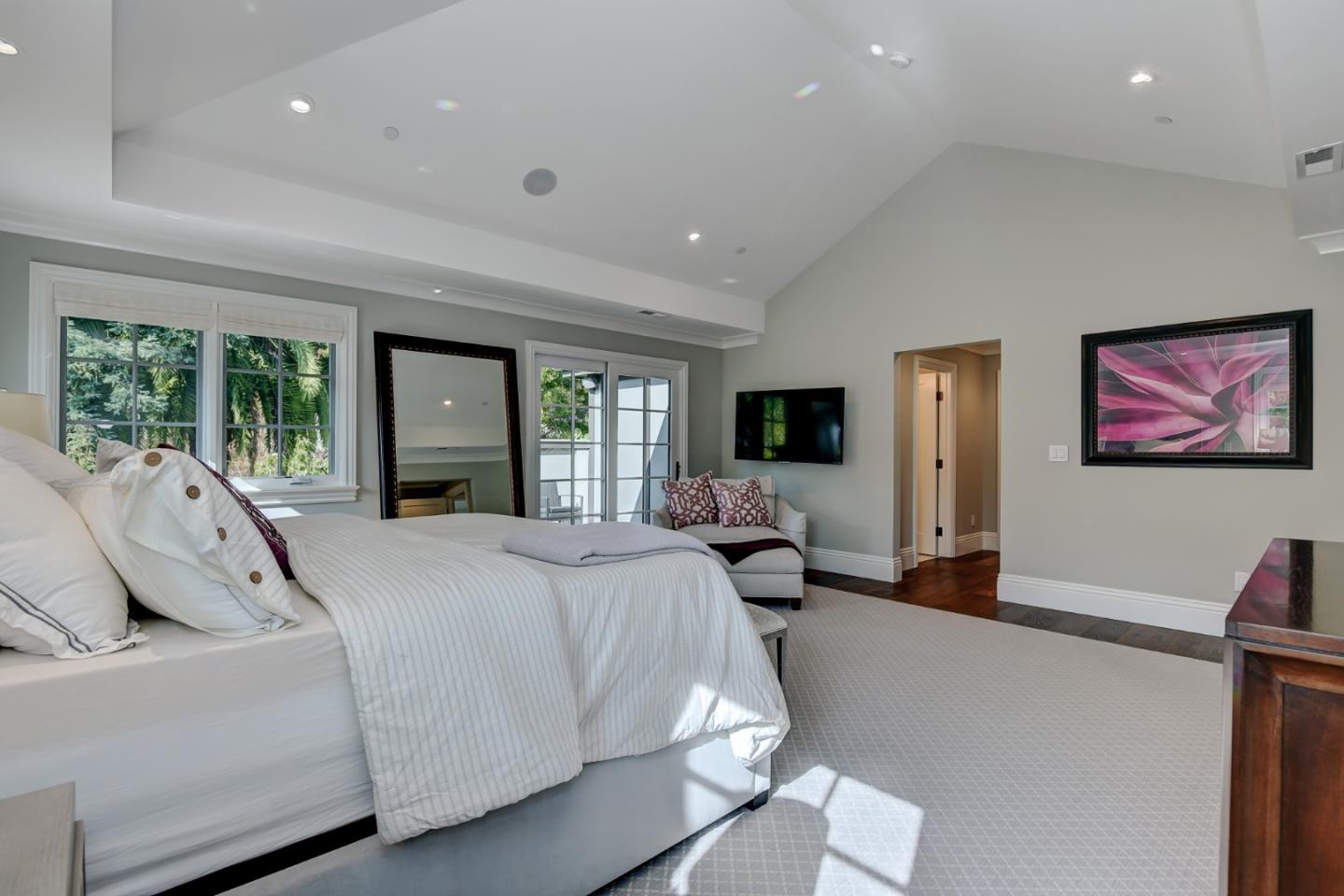 1025 Cabrillo Avenue Burlingame, CA 94010 - Photo 13 of 39 a bed room with a bed and large windows