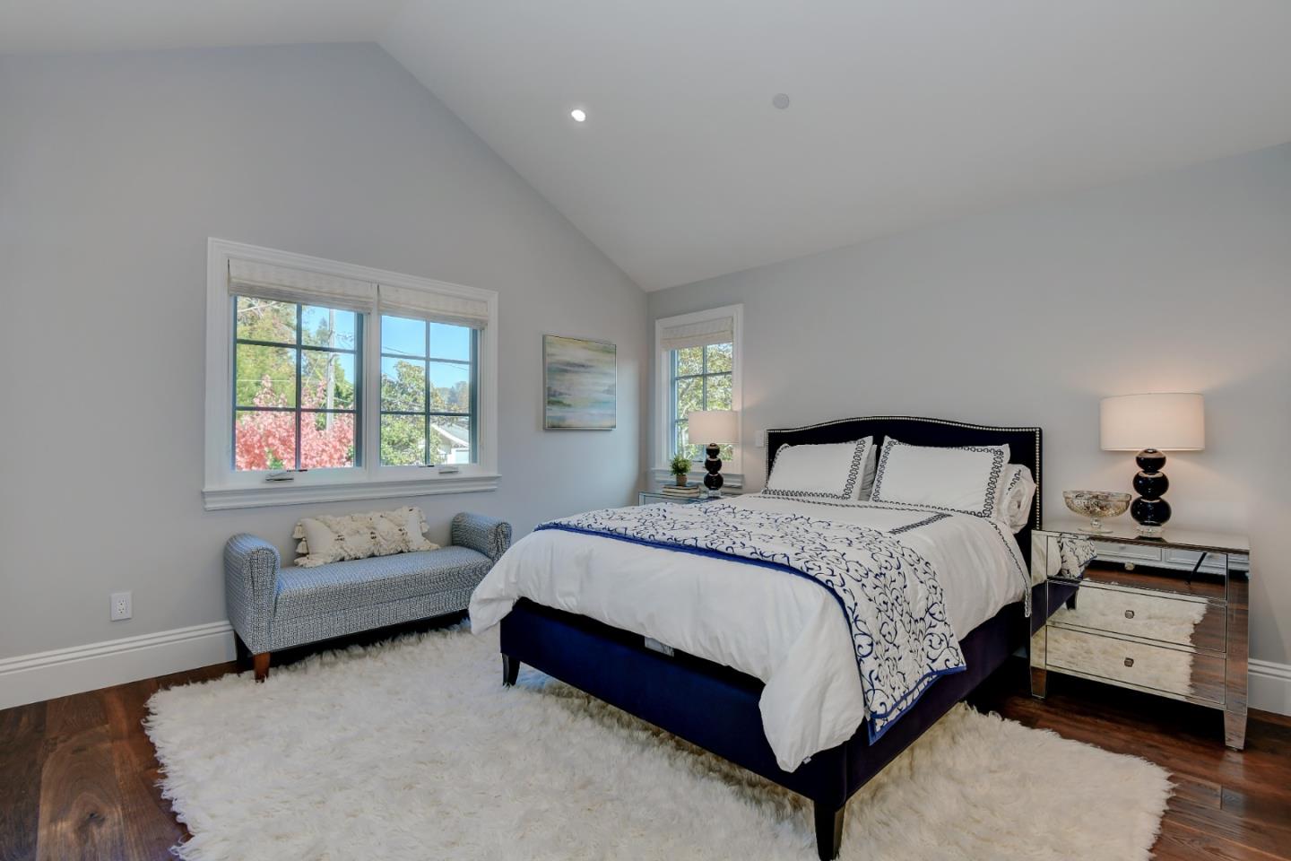 1025 Cabrillo Avenue Burlingame, CA 94010 - Photo 19 of 39 a bedroom with a bed and a couch