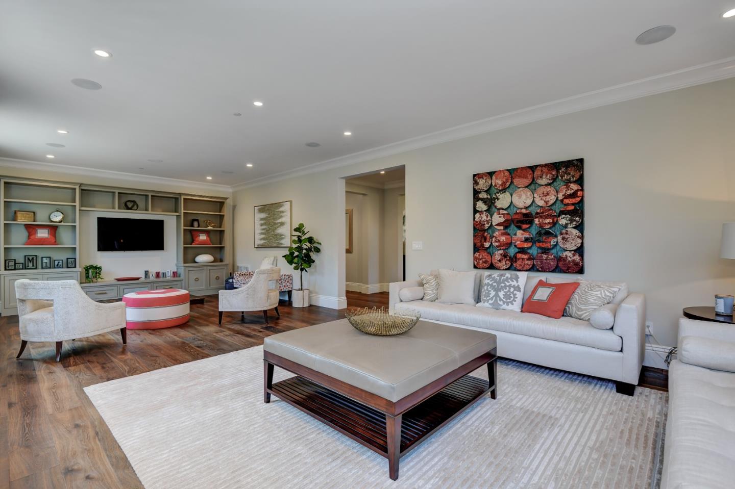 1025 Cabrillo Avenue Burlingame, CA 94010 - Photo 2 of 39 a living room with furniture a flat screen tv and a large window