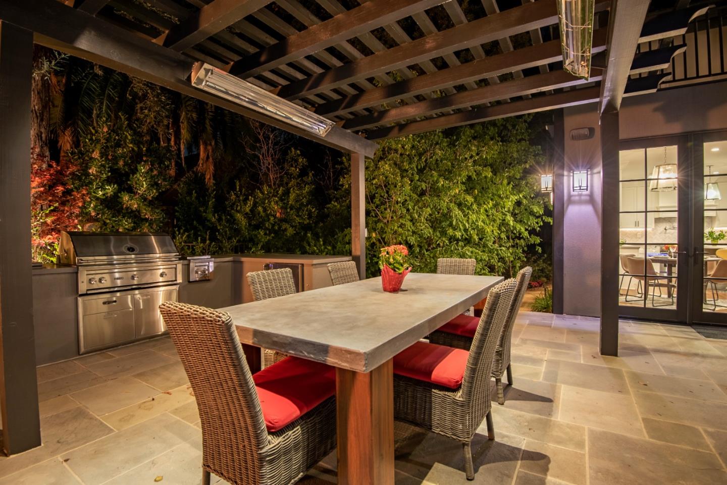1025 Cabrillo Avenue Burlingame, CA 94010 - Photo 30 of 39 a view of a dining table and chairs in the patio