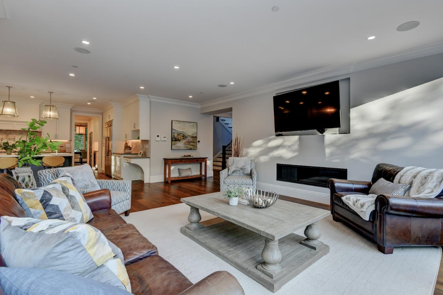 1025 Cabrillo Avenue Burlingame, CA 94010 - Photo 10 of 39 a living room with furniture and a flat screen tv
