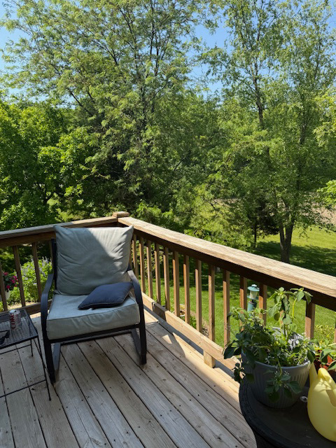 2984 Marshfield Court Elgin, IL 60124 - Photo 13 of 40 a view of a two chairs in the balcony