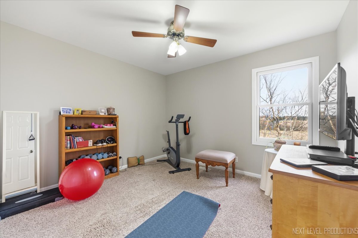 2984 Marshfield Court Elgin, IL 60124 - Photo 27 of 40 a view of a workspace with a window