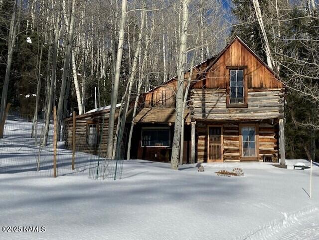 a front view of a house with a garage