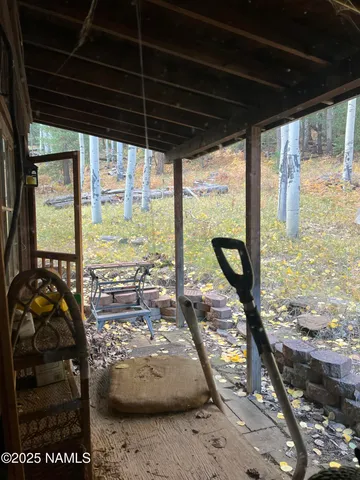 a view of a floor to ceiling window and kitchen view