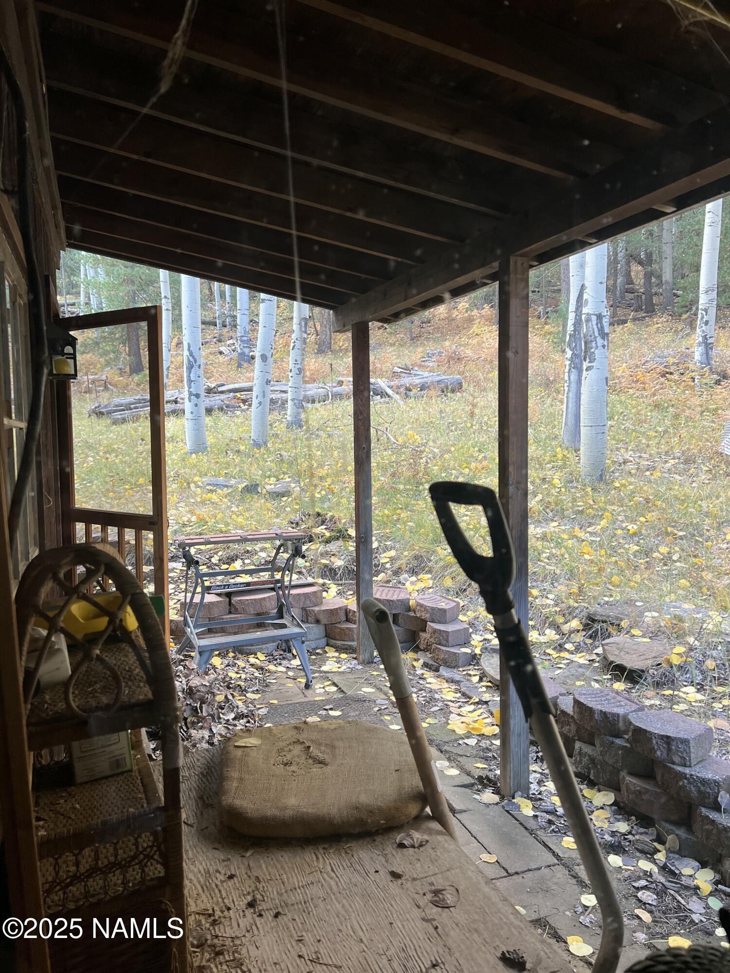 0 Forest Service 900 1k Road Northeast Flagstaff, AZ 86001 - Photo 11 of 25 a view of a floor to ceiling window and kitchen view