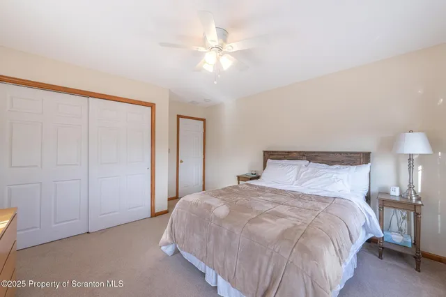 a view of livingroom with furniture and windows