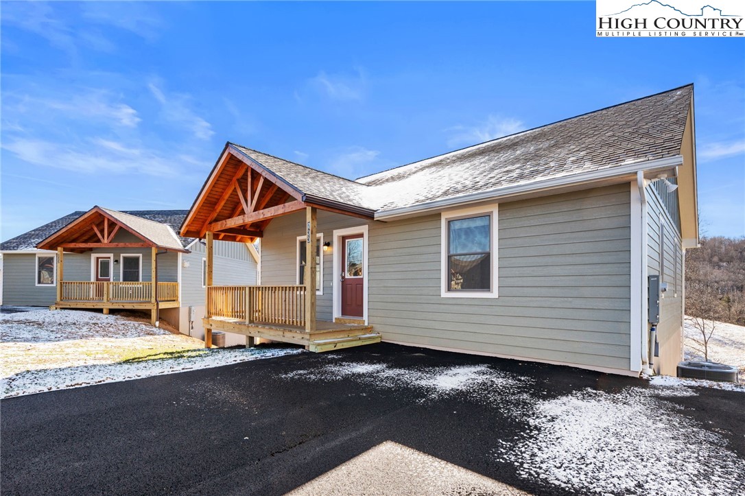245 Ava Way, Unit 108 Boone, NC 28607 - Photo 28 of 29 a front view of a house with a yard