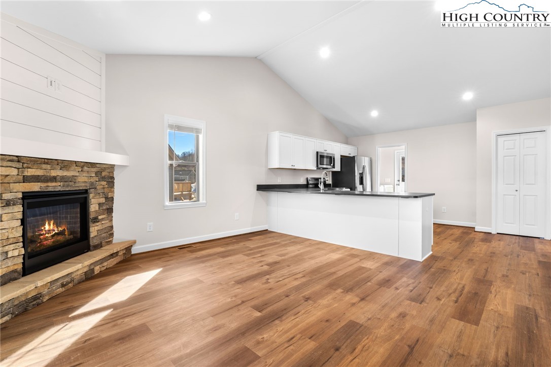 245 Ava Way, Unit 108 Boone, NC 28607 - Photo 8 of 29 a view of kitchen with microwave and cabinets