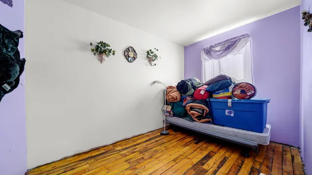 a bathroom with a toilet sink shower and mirror