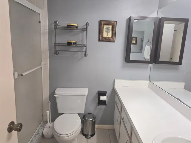 a view of room with stairs and white walls