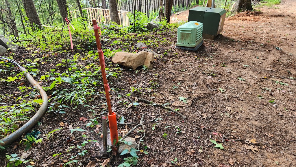Lot 32 Calvender Road Turtletown, TN 37391 - Photo 12 of 15 a view of a garden with plants and wooden fence