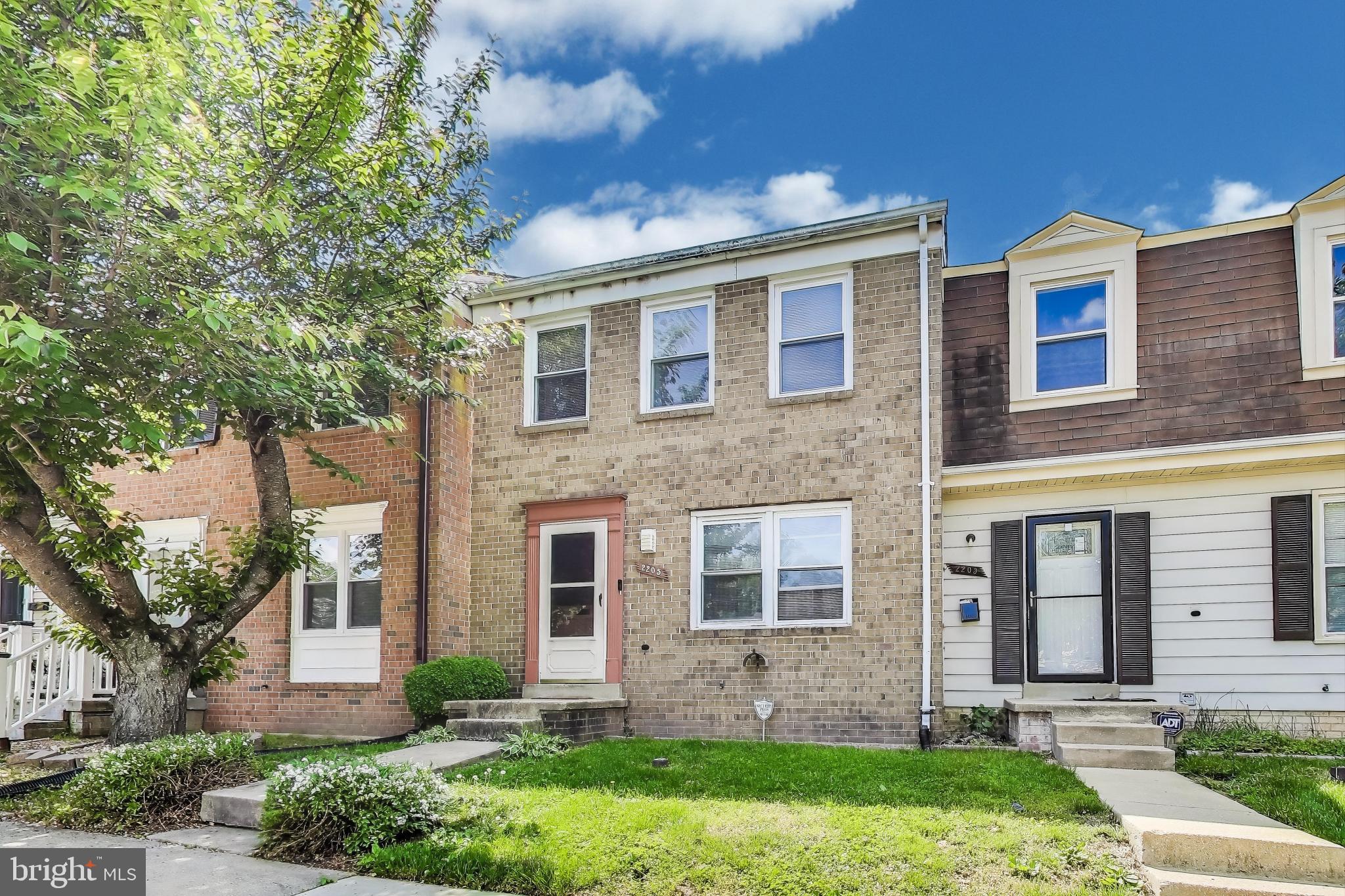 front view of house with a yard