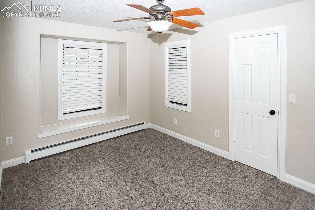 5630 Ramblin Rose Road Colorado Springs, CO 80908 - Photo 13 of 29 Bedroom 2 with walk-in closed and oversized window sill to sit in.