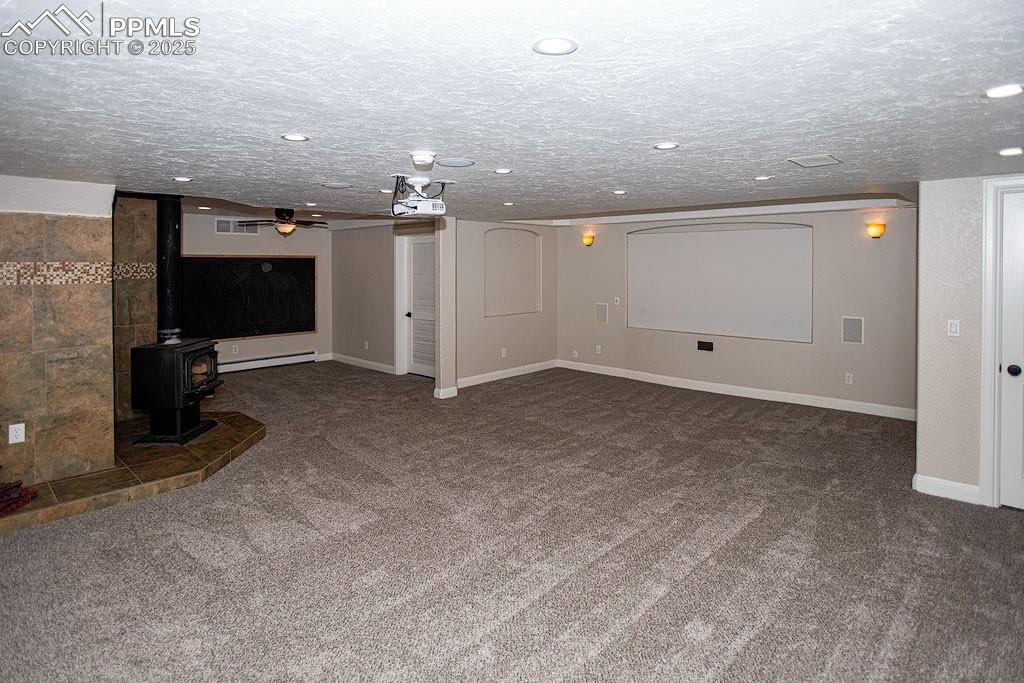 5630 Ramblin Rose Road Colorado Springs, CO 80908 - Photo 14 of 29 Theater room lower level