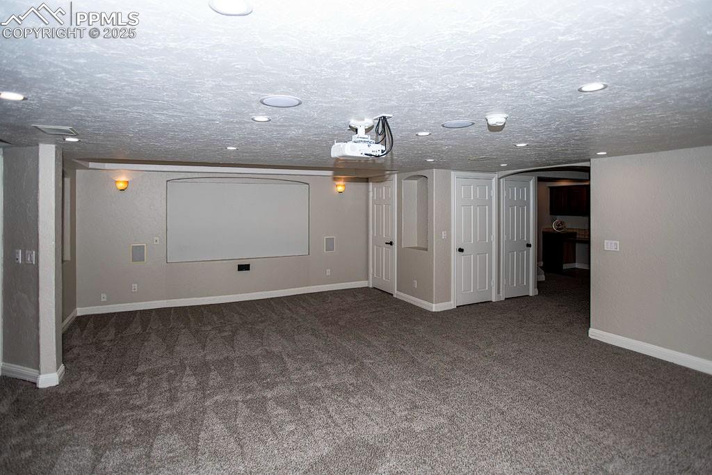 5630 Ramblin Rose Road Colorado Springs, CO 80908 - Photo 15 of 29 Theater Room lower level