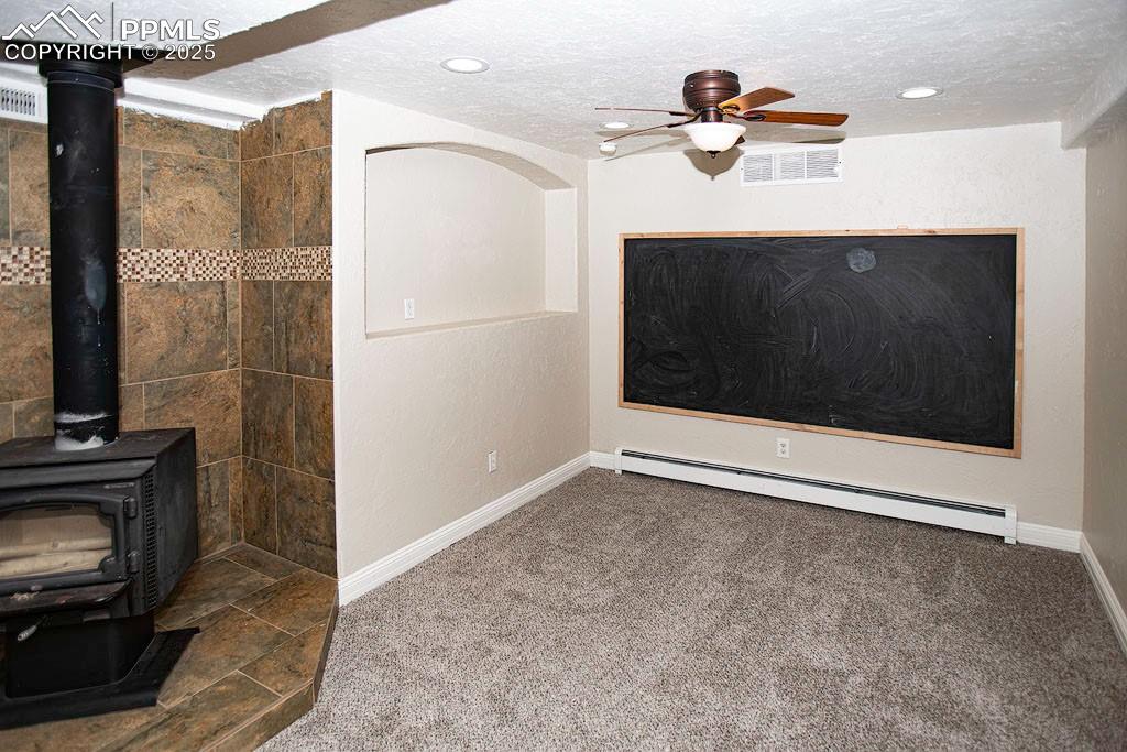 5630 Ramblin Rose Road Colorado Springs, CO 80908 - Photo 16 of 29 Play area with chalk board lower level