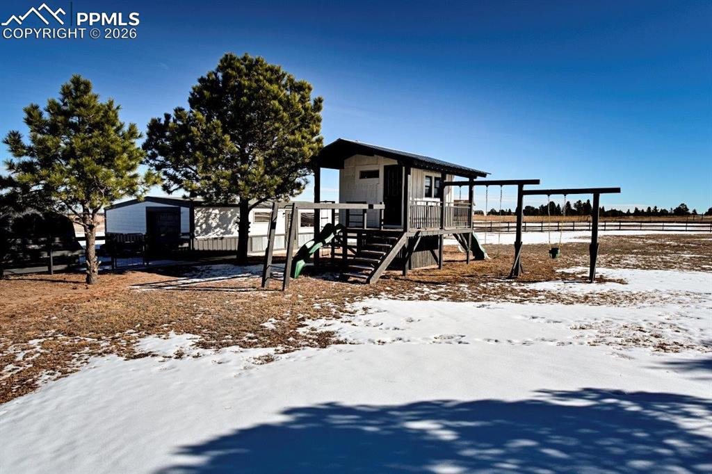 5630 Ramblin Rose Road Colorado Springs, CO 80908 - Photo 19 of 29 Front of Custom Playhouse