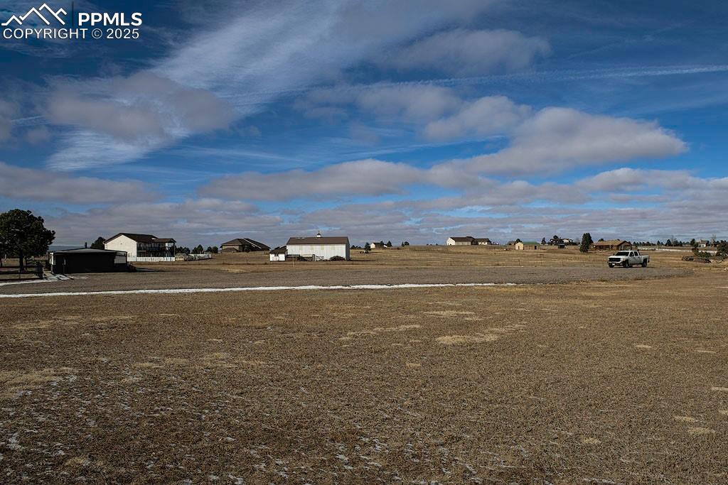 5630 Ramblin Rose Road Colorado Springs, CO 80908 - Photo 23 of 29 Back of property with detached garage