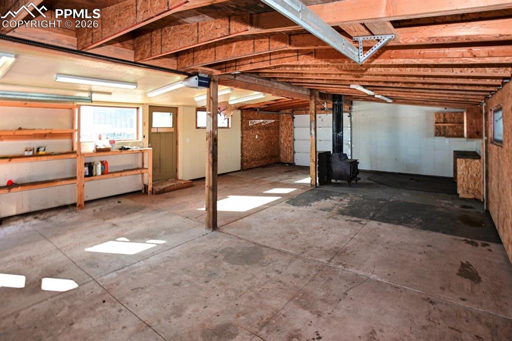 5630 Ramblin Rose Road Colorado Springs, CO 80908 - Photo 27 of 29 Second View of Garage for Toys. Notice 2nd garage door. No backing in just pull through.