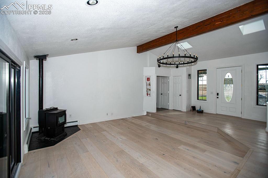 5630 Ramblin Rose Road Colorado Springs, CO 80908 - Photo 6 of 29 Living Room view looking towards hallway to bedrooms.
