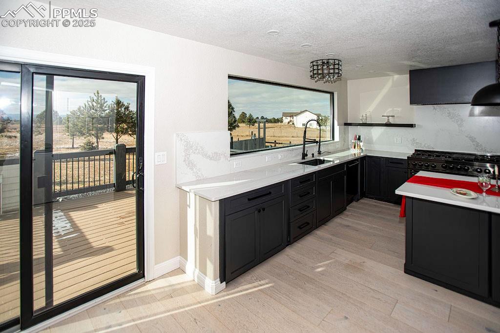 5630 Ramblin Rose Road Colorado Springs, CO 80908 - Photo 9 of 29 Kitchen view from garage