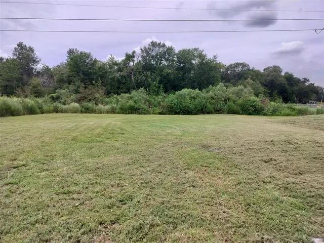 a view of a field with an outdoor space
