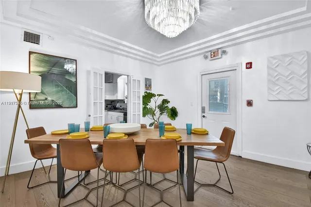 a bathroom with a granite countertop toilet and a shower