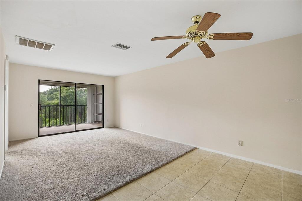 26485 Rampart Boulevard, Unit A27 Punta Gorda, FL 33983 - Photo 24 of 27 a view of a room with a large window