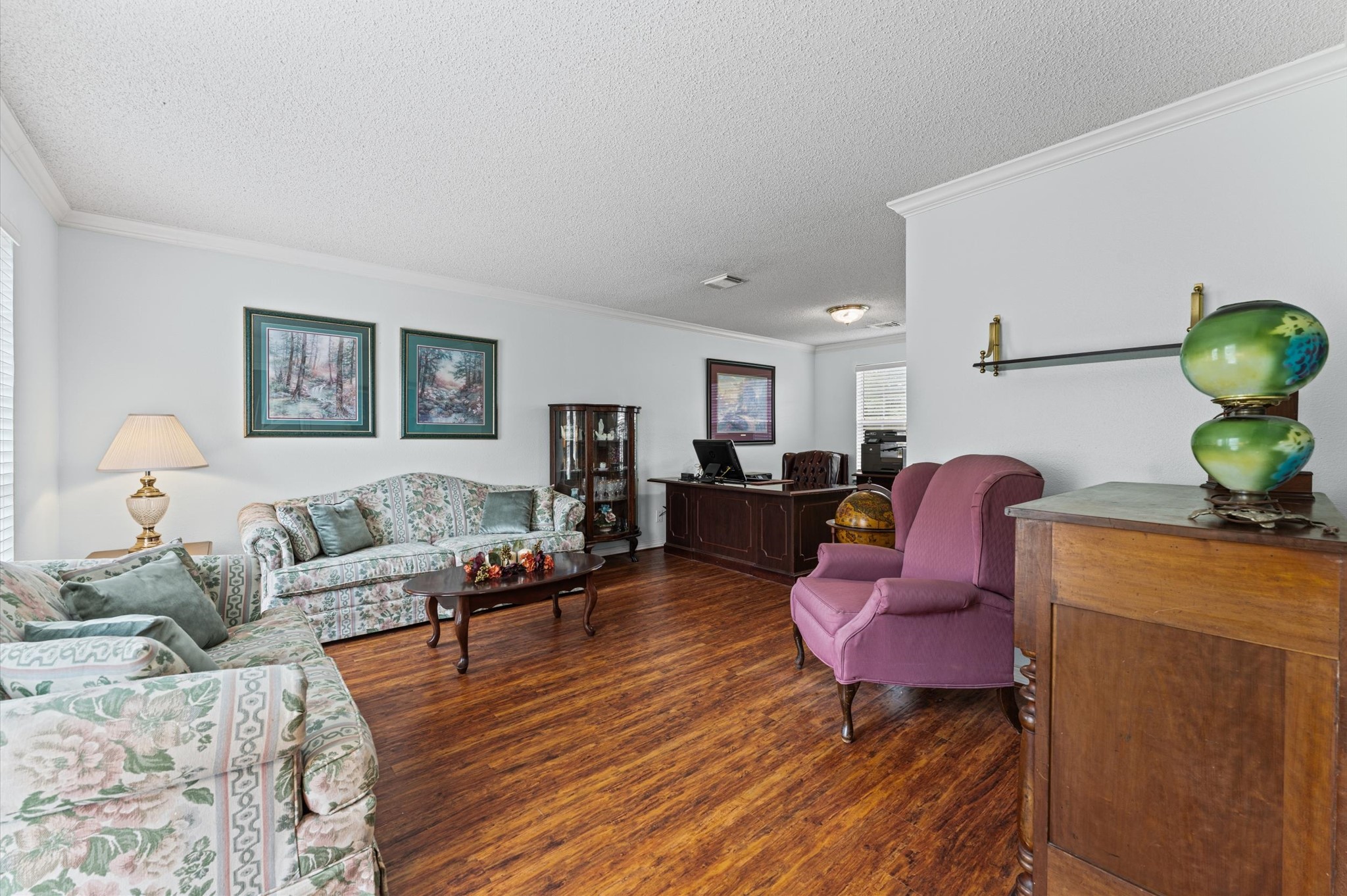9903 Burntfork Street Houston, TX 77064 - Photo 6 of 25 Another view of the formal living area, that leads into the formal dining that's currently being used as a home office.