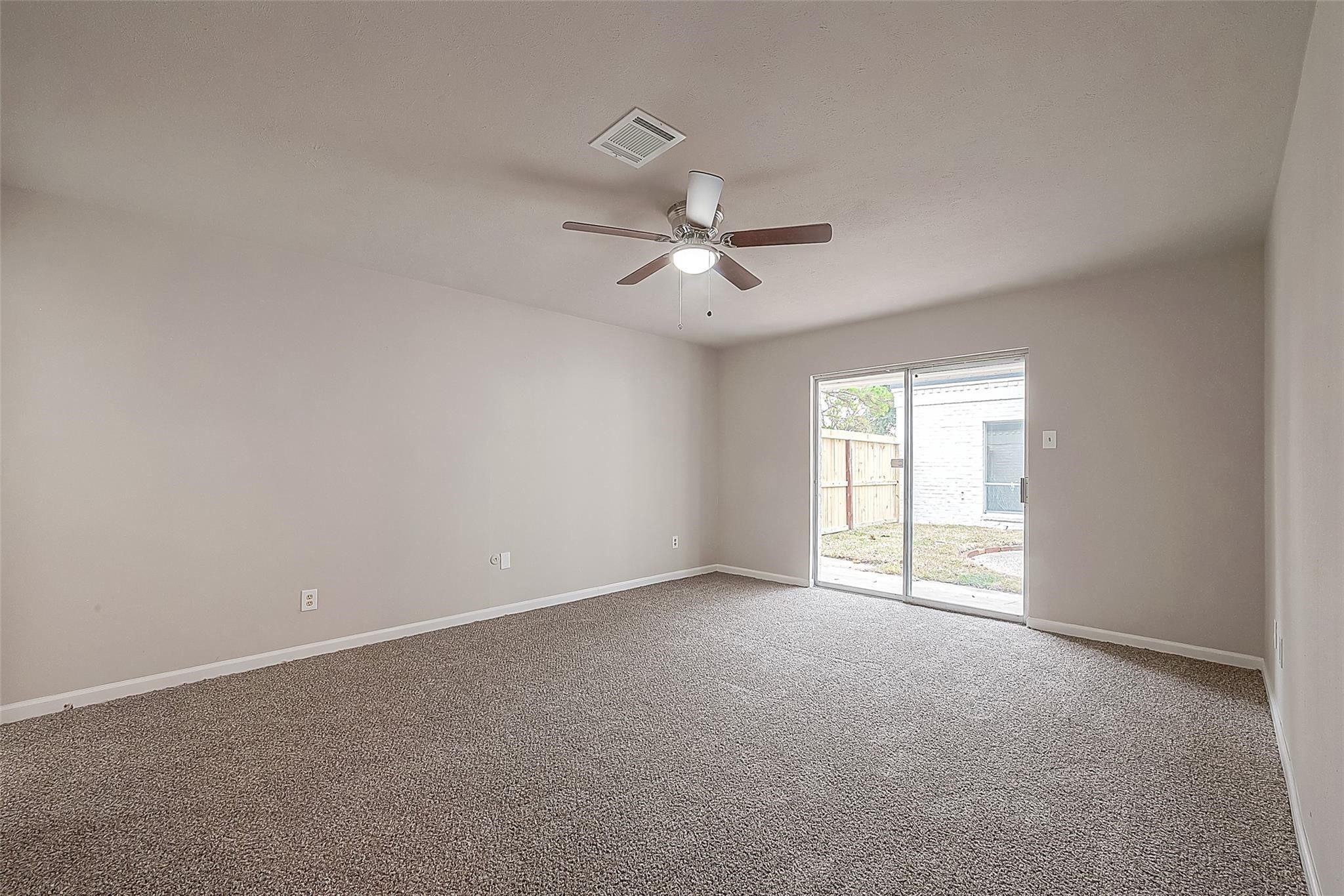 10811 Villa Lea Lane Houston, TX 77071 - Photo 26 of 34 a view of an empty room with a window