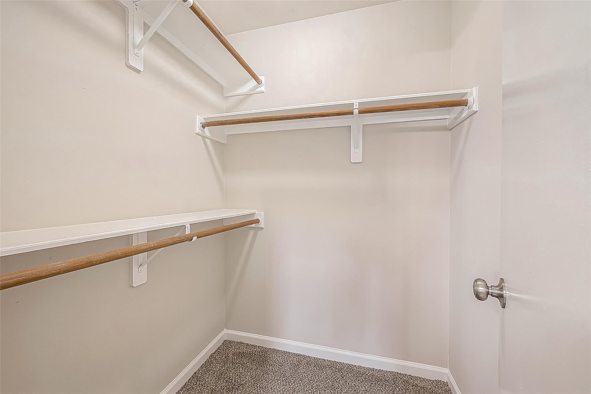 10811 Villa Lea Lane Houston, TX 77071 - Photo 31 of 34 a view of an empty walk in closet