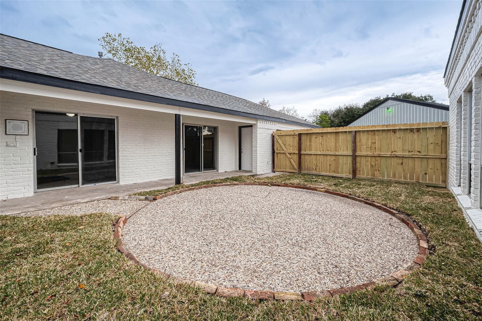 10811 Villa Lea Lane Houston, TX 77071 - Photo 33 of 34 front view of a house with a wooden fence