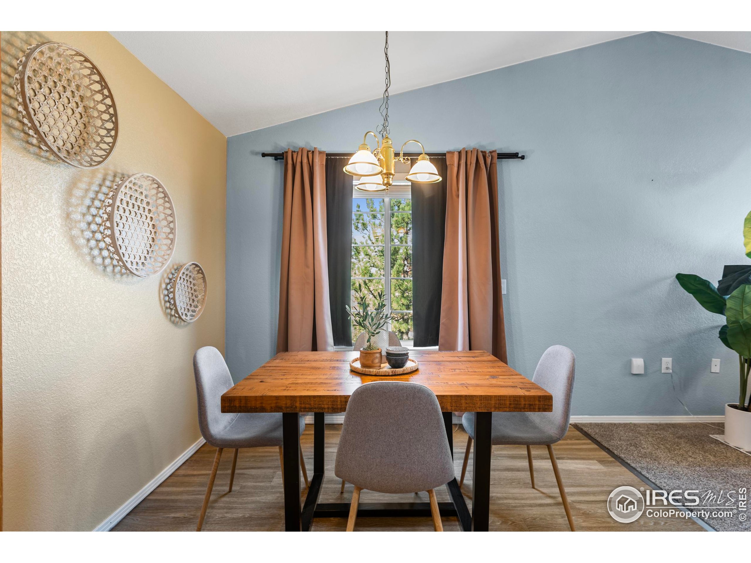 3002 West Elizabeth Street, Unit G Fort Collins, CO 80521 - Photo 12 of 28 a dining room with furniture and window