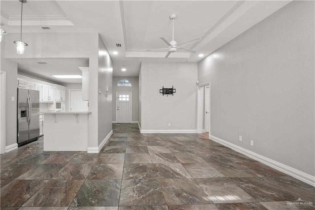 2200 East 19th Street Mission, TX 78572 - Photo 3 of 12 a view of a hallway with a kitchen