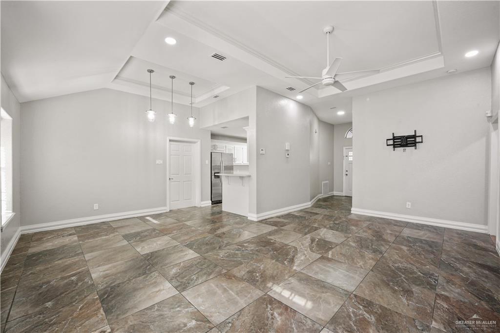 2200 East 19th Street Mission, TX 78572 - Photo 4 of 12 a view of an empty room with a ceiling fan