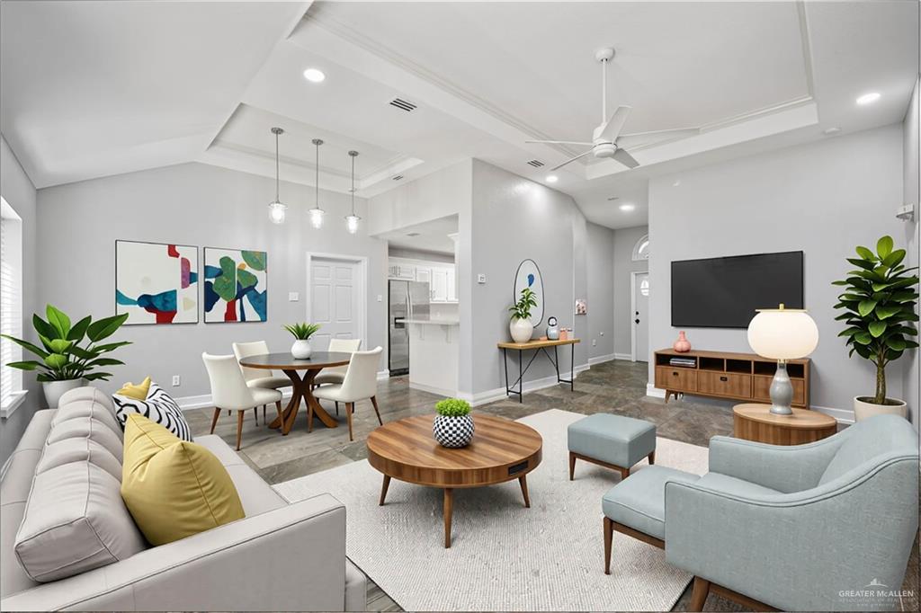 2200 East 19th Street Mission, TX 78572 - Photo 5 of 12 a living room with furniture potted plant and a chandelier