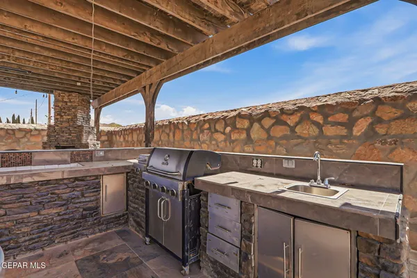 a bathroom with a sink a vanity and dryer