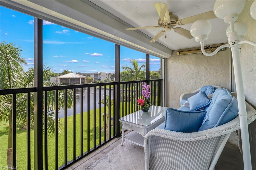 788 Park Shore Drive, Unit E32 Naples, FL 34103 - Photo 24 of 35 a balcony with furniture