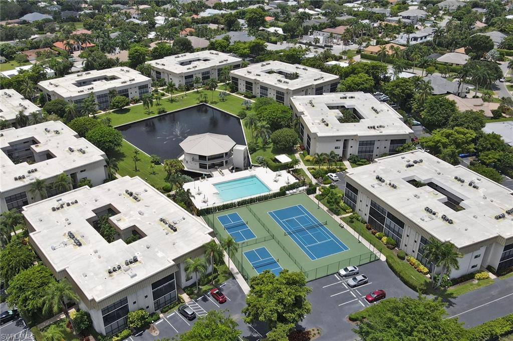 788 Park Shore Drive, Unit E32 Naples, FL 34103 - Photo 29 of 35 an aerial view of a house with a garden