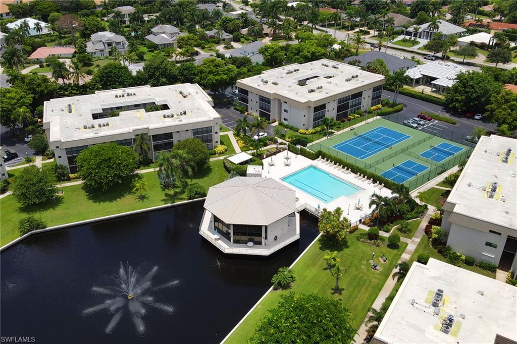 788 Park Shore Drive, Unit E32 Naples, FL 34103 - Photo 32 of 35 an aerial view of a house with a garden