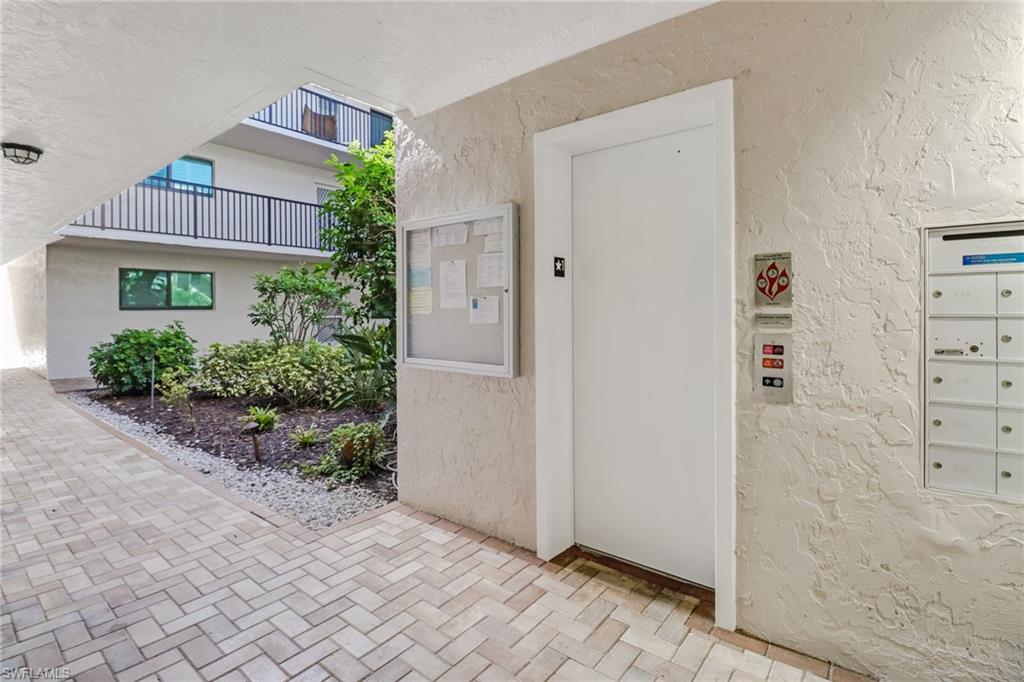 788 Park Shore Drive, Unit E32 Naples, FL 34103 - Photo 5 of 35 front view of a house