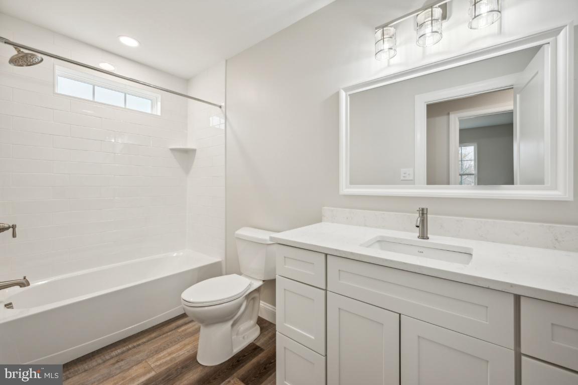 459 Berkley Road Mantua, NJ 08051 - Photo 22 of 28 a bathroom with a sink toilet tub and shower